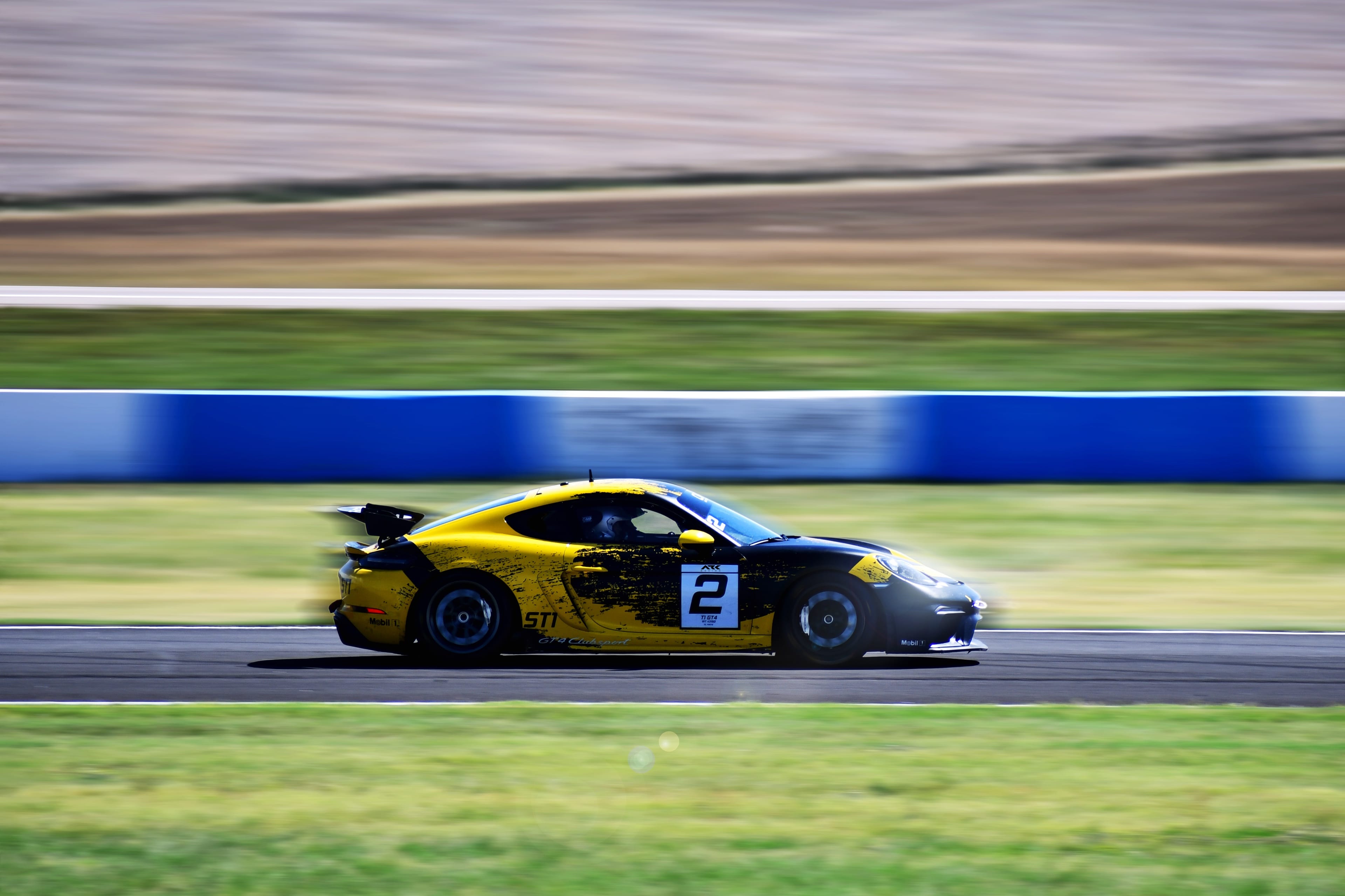 ARK Race Team Porsche 718 Cayman GT4 Clubsport at speed